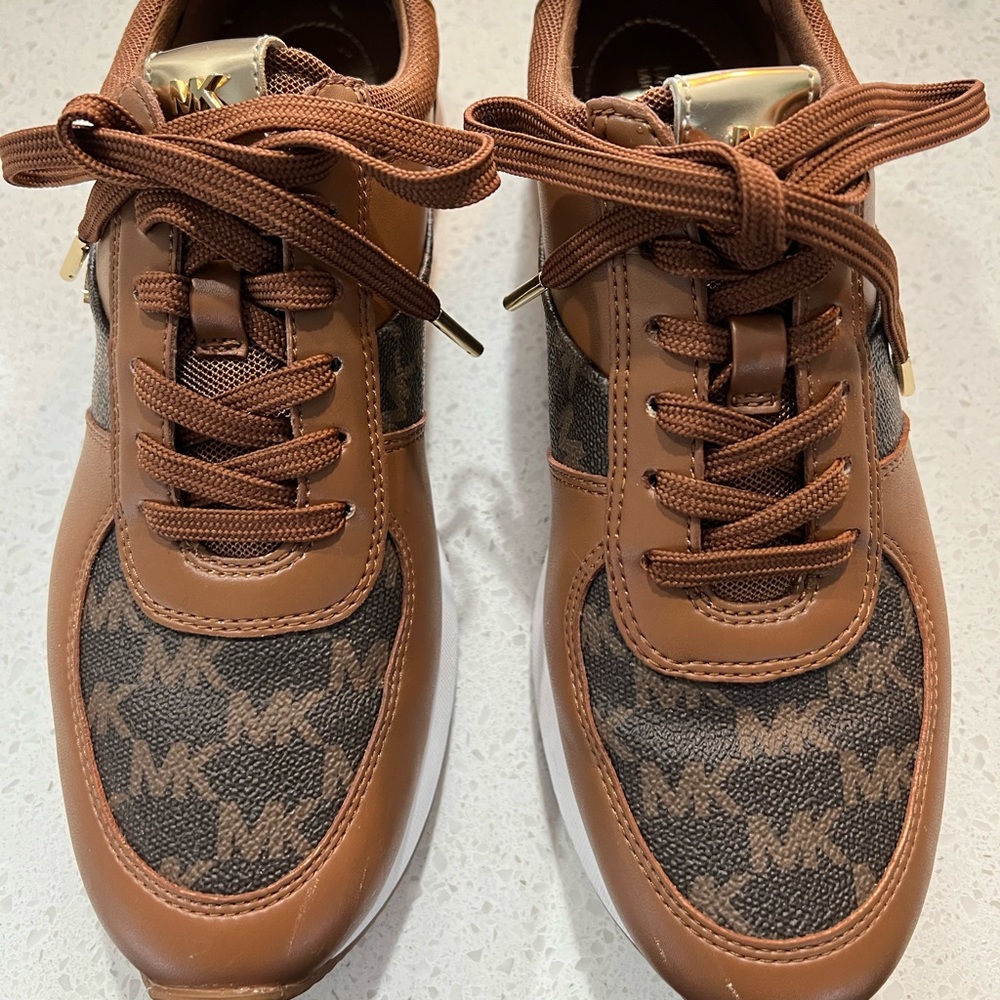 Michael Kors tennis shoes / size 7 / slightly used / minor scratches